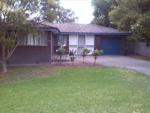 Hillvue home. Pool and relaxing back deck.