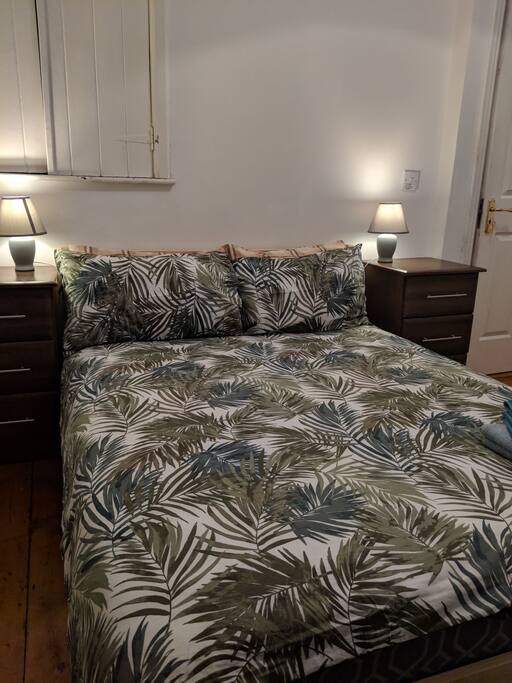 Comfy Double bed with 4 pillows.