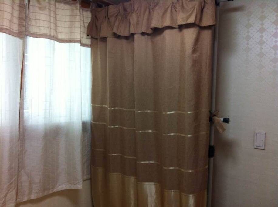 With curtained hanger