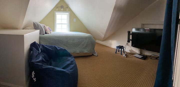 The loft has a double bed and a large screen for video games or DVDs.