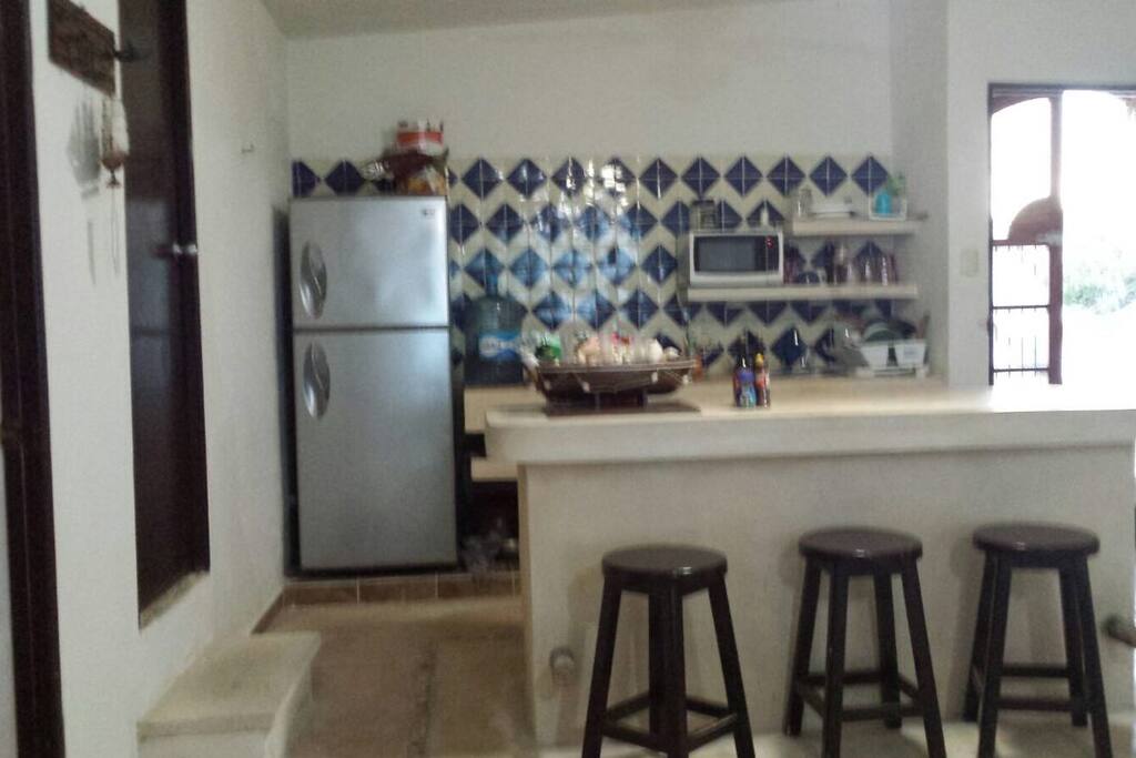 Cocina con barra para mejor convivencia