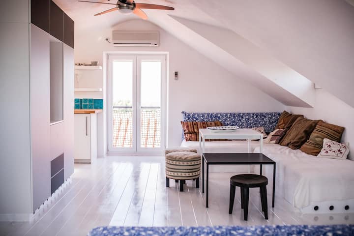 Third Floor (Attic): Clearly our most photogenic floor. And equally clearly, light and white is our design motto :-) Check out the handmade tiles in the kitchen.