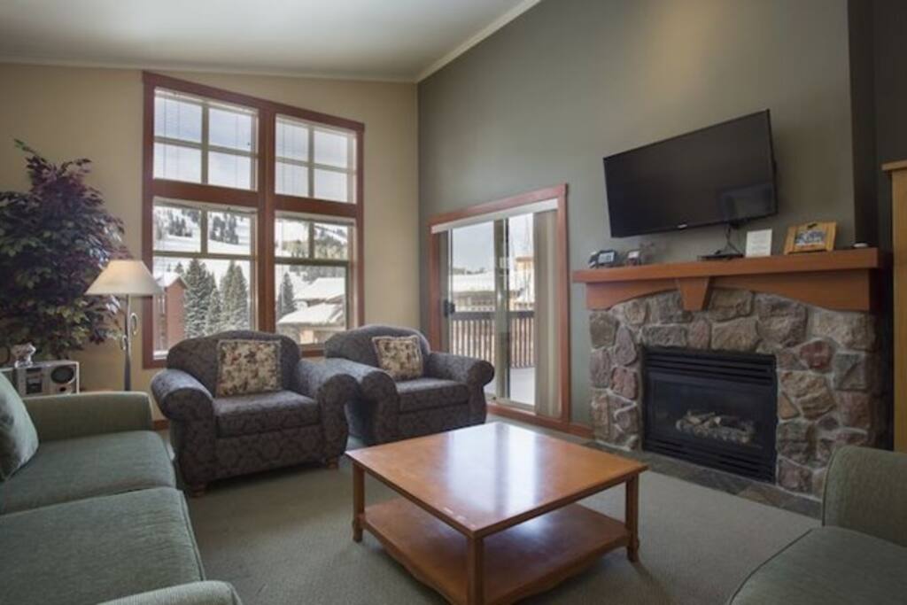 Watch a movie on the flat screen and warm up in front of the fireplace.
