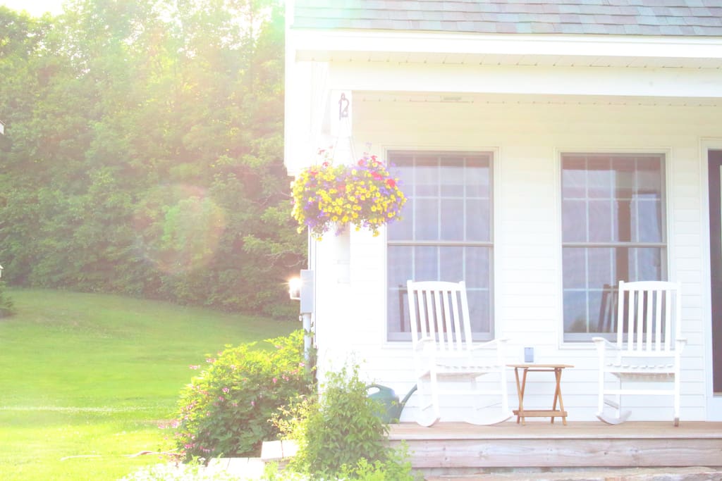 The porch offers a great place to enjoy your morning coffee or read in the shade of the afternoon