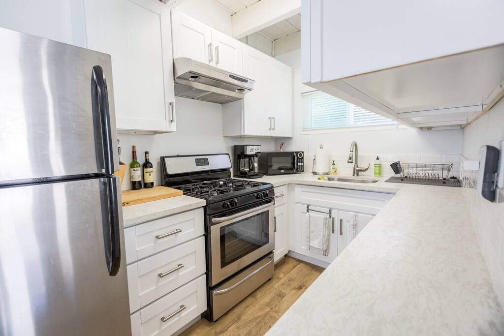 quartz counters, stainless appliances