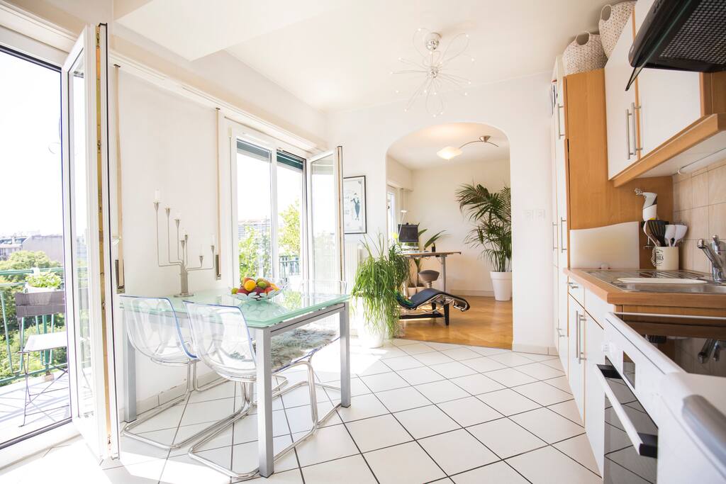 Kitchen with direct access to balcony and view to the Jura mountains