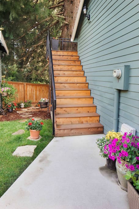 Stairs leading up to the deck and suite entrance.