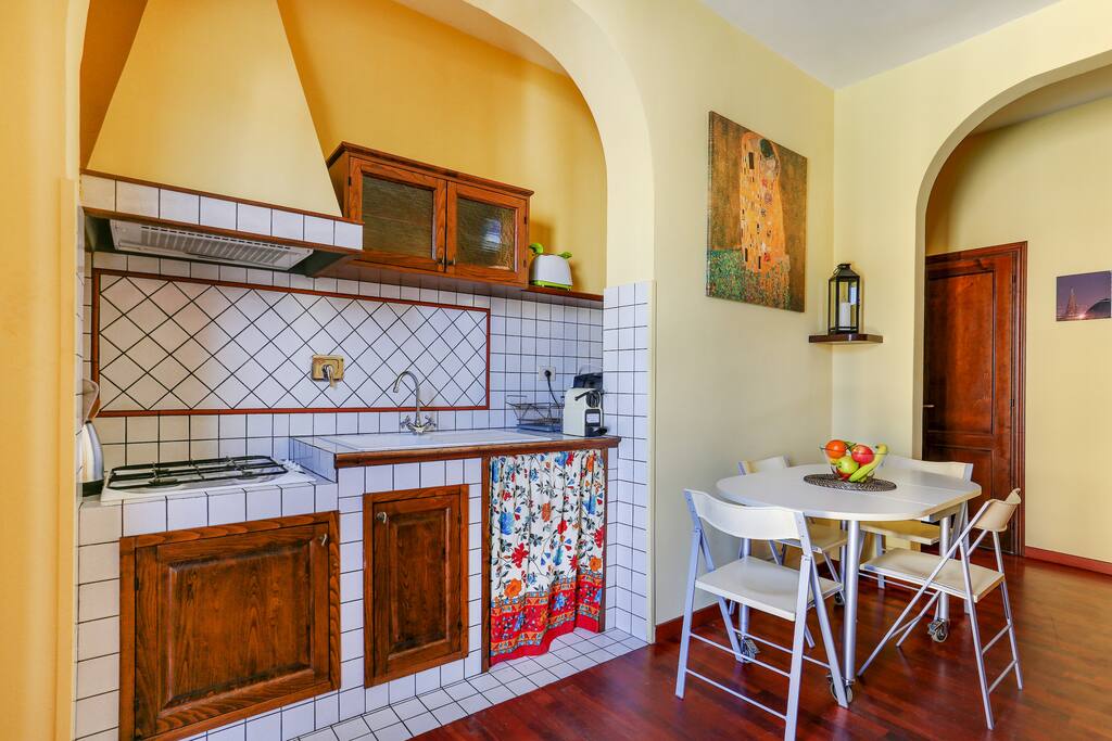 The Living room & The equipped Kitchen