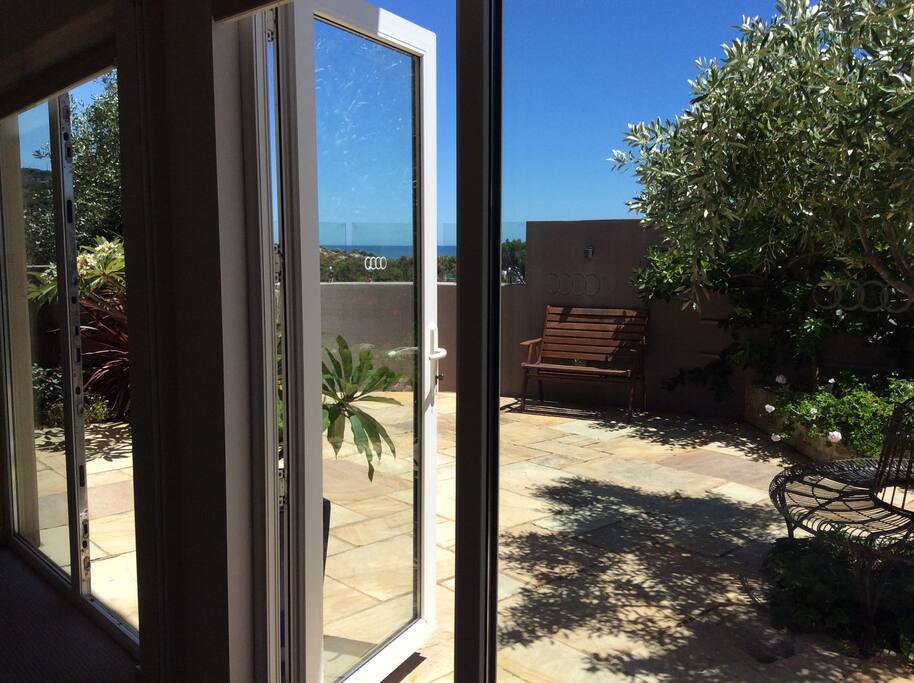 Both the Lounge and Bedroom have doors opening to the marble hewn paved Courtyard.