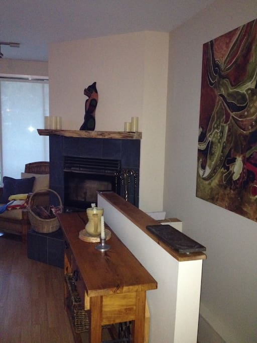 fireplace and access to basement