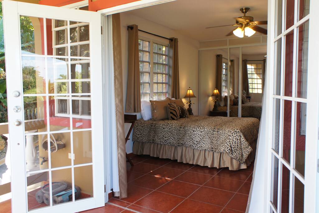 French doors lead to the pool level