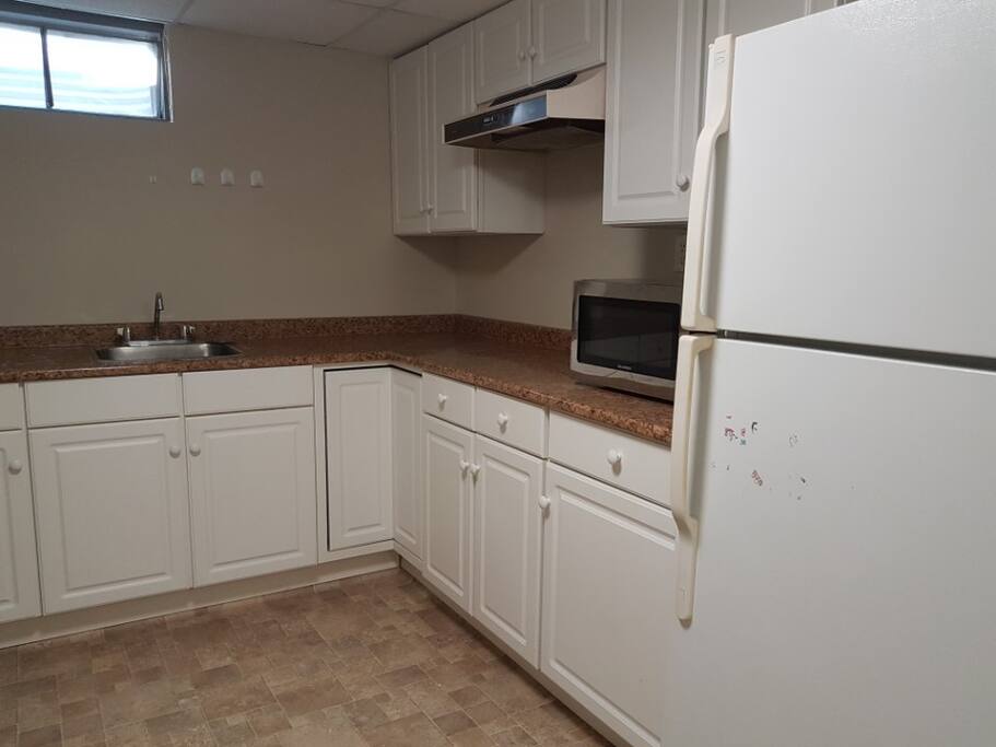 you can use the kitchen, stove, microwave included. there are also a washer and a dryer