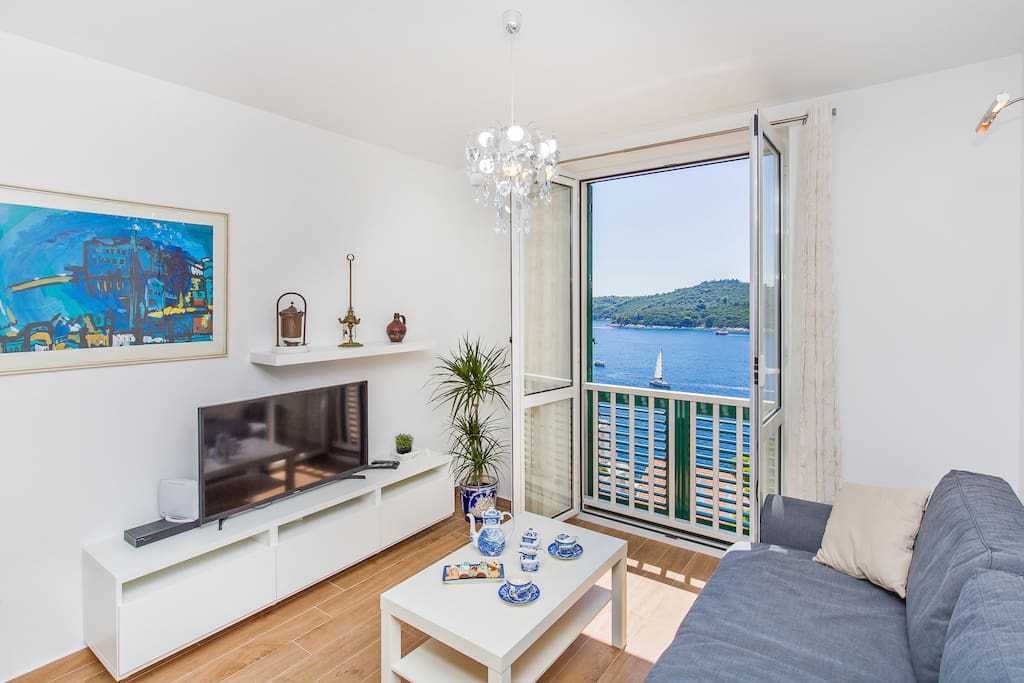 Sofa, TV and beautiful sea view.