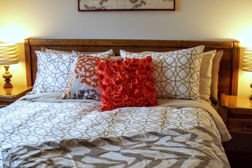 Private bedroom with queen-sized memory foam mattress and television with premium cable