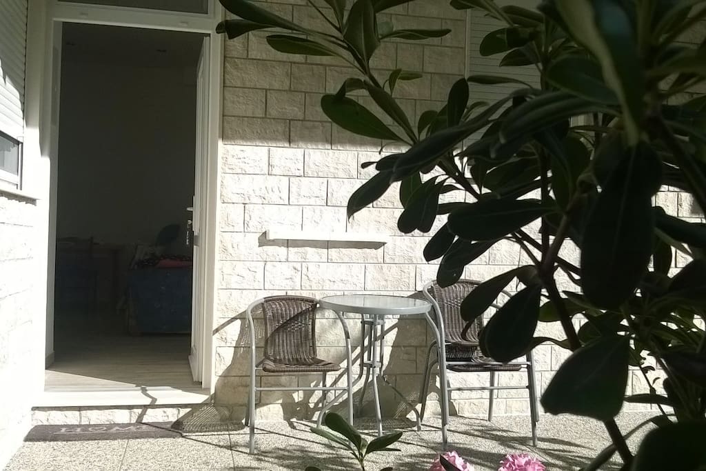 entrance to the apartment in the sun