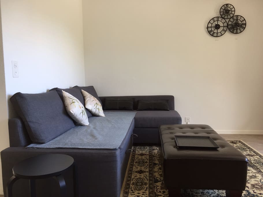 Spacious living room with a fantastic view and a double sofa bed