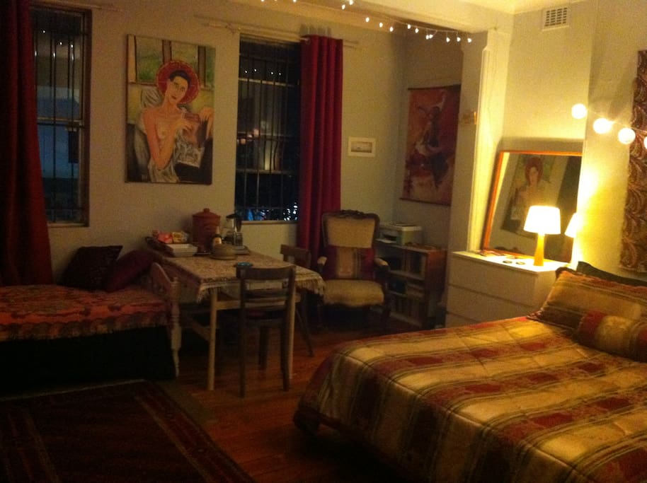 The room has seen a few rearrangements; it's sunny by day and glamorous at night.