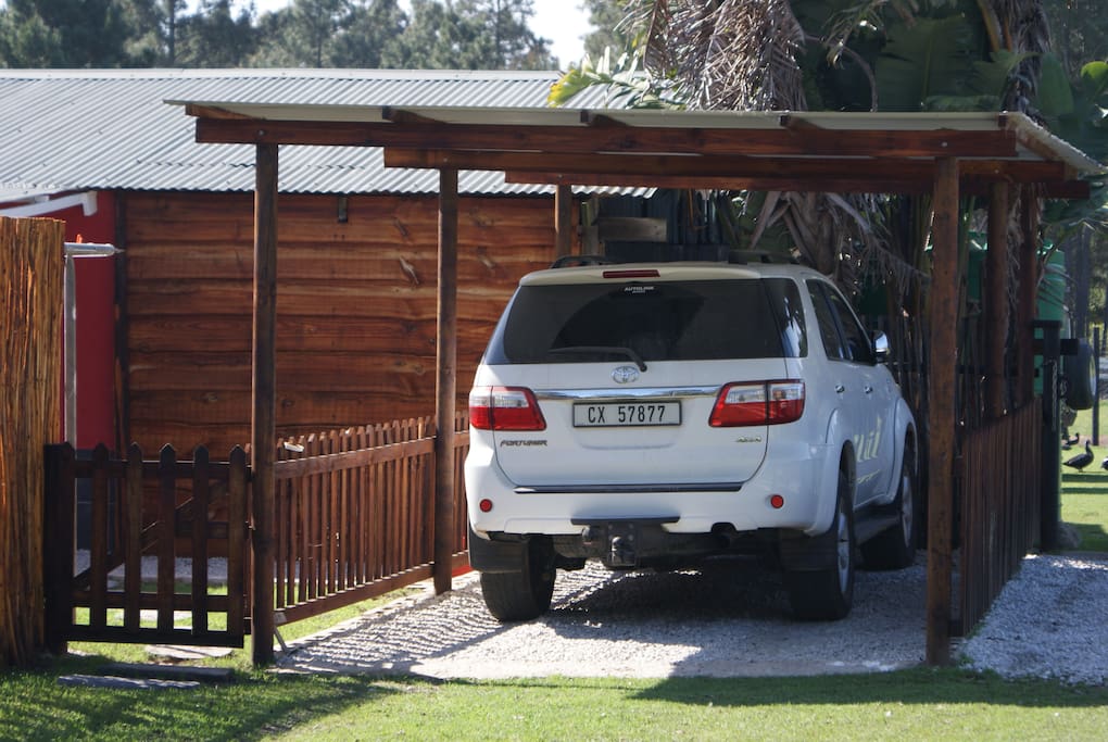 Sheltered Parking area & there is also an Open Parking Bay available for this Cottage