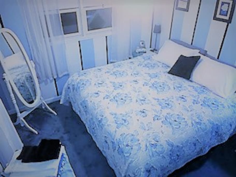 Brand new king size bed with extra pillows and blankets for your comfort.