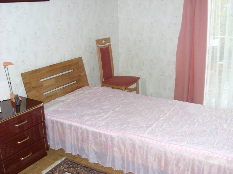 Bedroom with a single bed