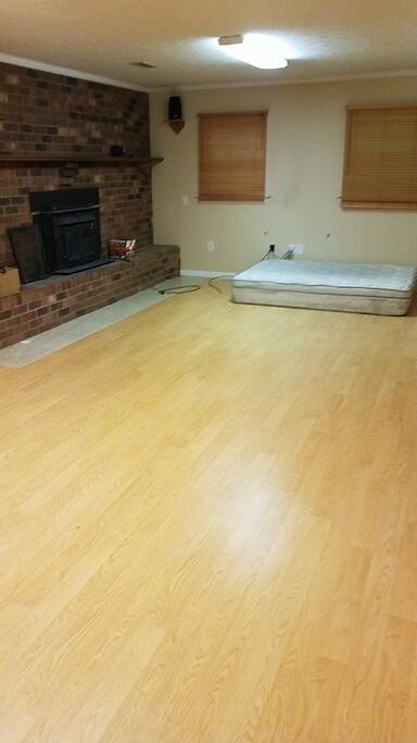 Downstairs room view 2 - this is one QUEEN Size mattress.. Bring your own Sheets.