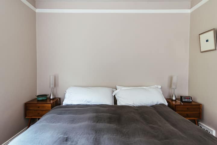 The master bedroom has a newly remodeled, en suite bathroom with bathtub and separate shower.