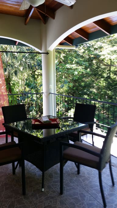 Dinning on the Terrace with sounds of the jungle, birds, monkeys, dream gurgling by.
