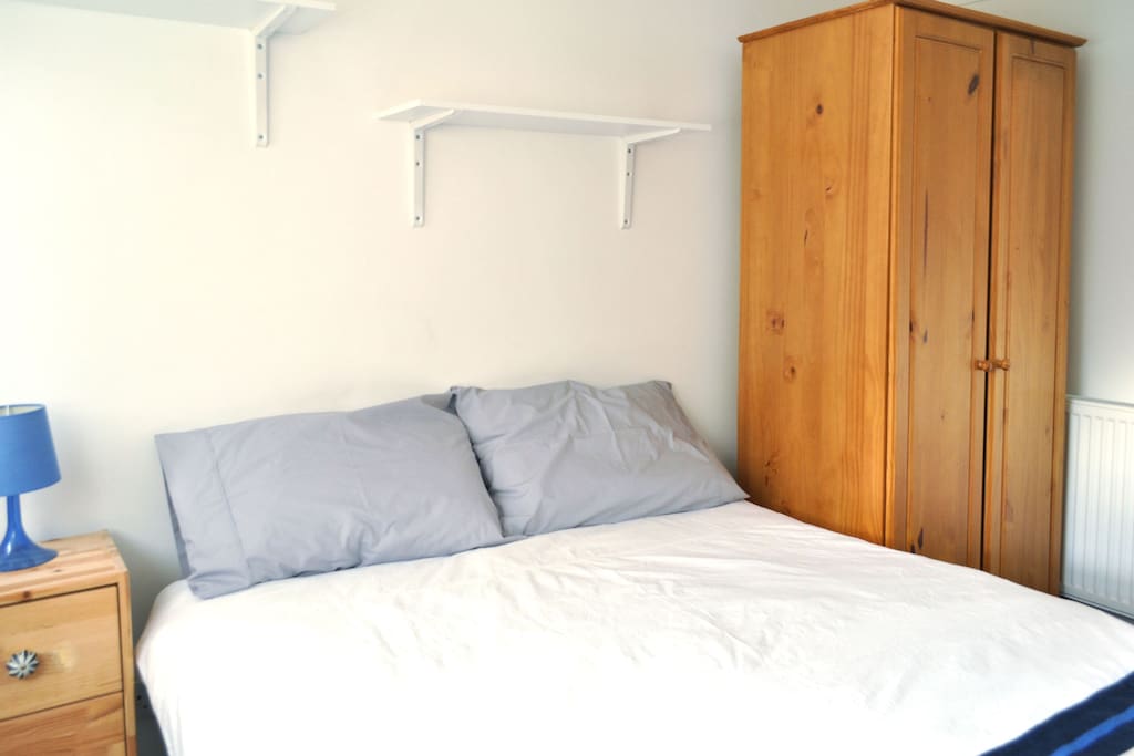There's plenty of storage in the room, drawers and a wardrobe, and lots of light.