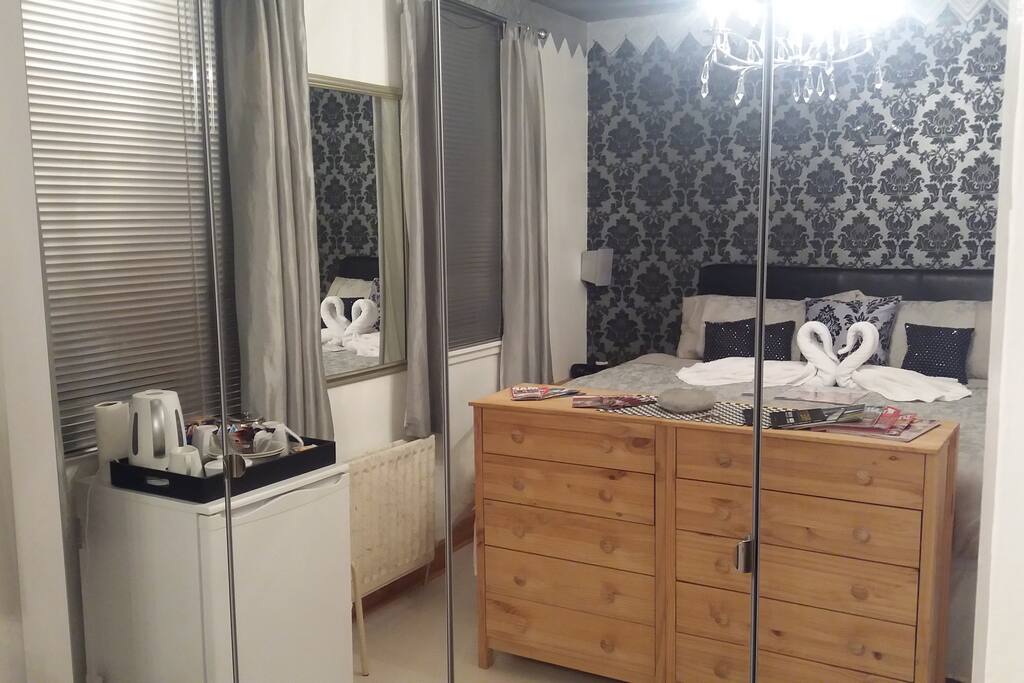 Bedroom reflection in mirrors