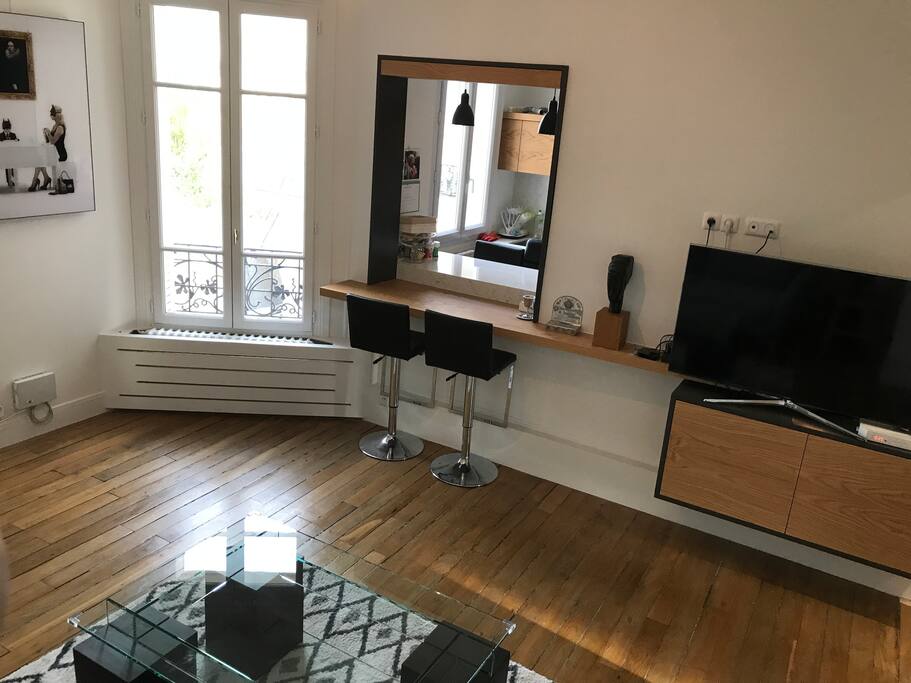 Salon avec cuisine ouverte