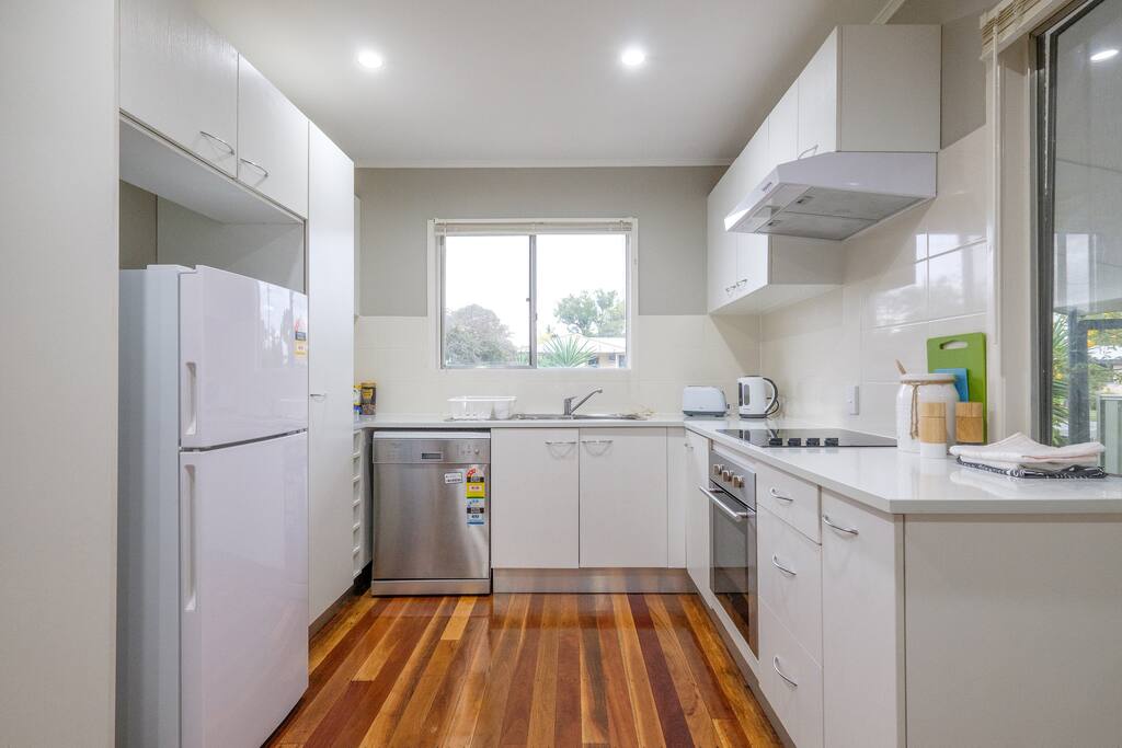 Kitchen with stainless steel appliances.