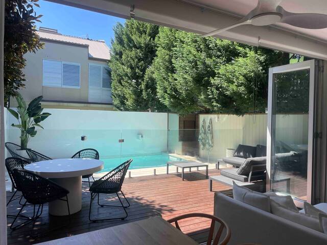 Family beach house with a pool.