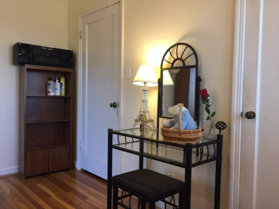 A bookshelf and a makeup table