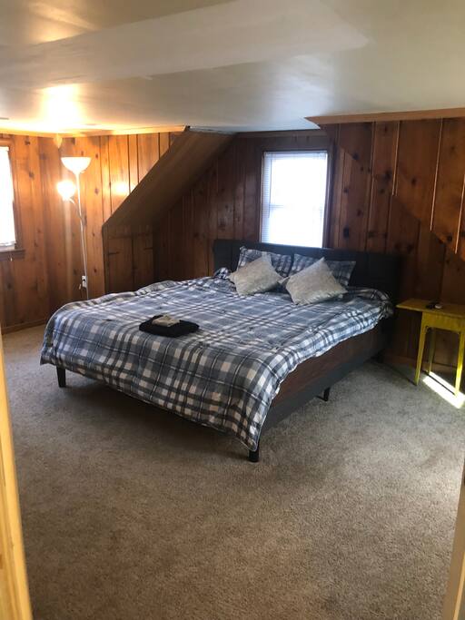 Spacious room with comfortable memory King size bed and bed side table. Extra air mattress available for extra guests available upon request.