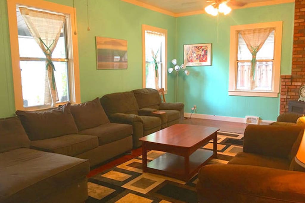 Living room with comfy couches, easy chairs and so on