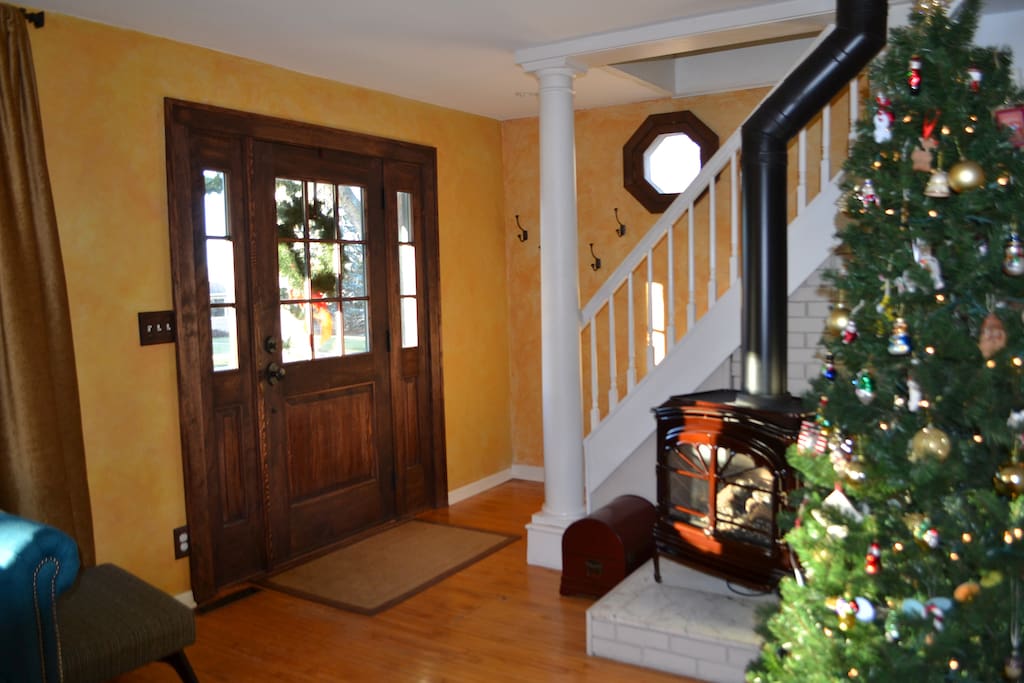 Inviting entrance with a gas fireplace