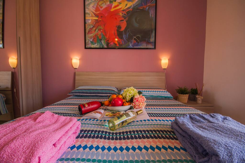 Comfortable and bright bedroom with spacious wardrobe