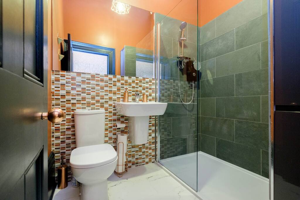 The bathroom has a great shower and comes stocked with toiletries