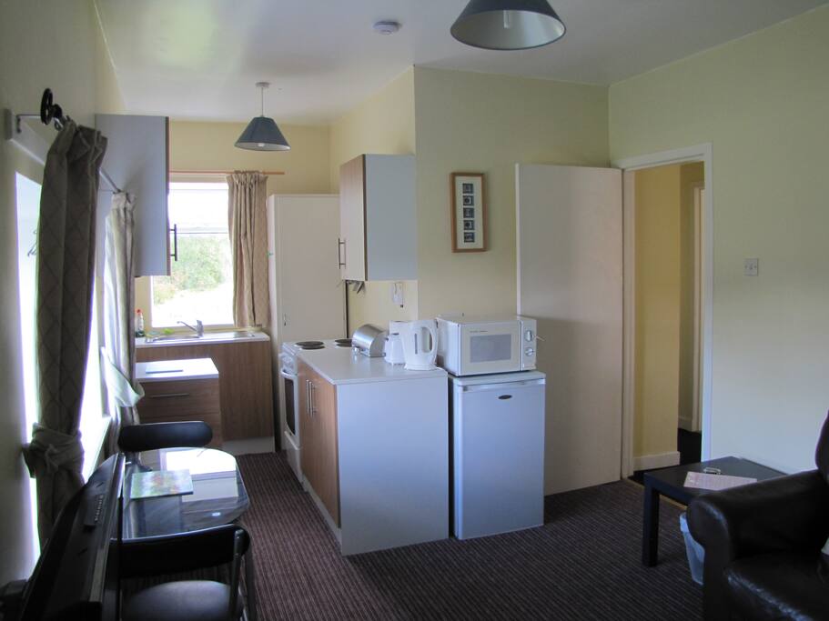 Towards dining/kitchen end of Campbell open plan area.