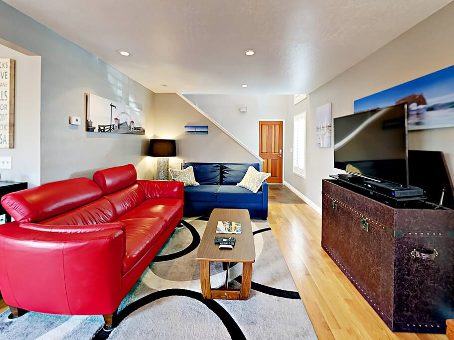 Screen a film on the 48” flat screen TV with cable, or convene around the coffee table for a game night.