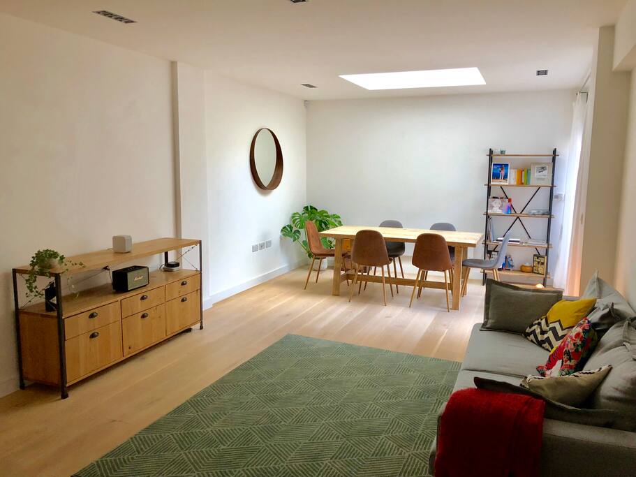 The living room has a skylight window