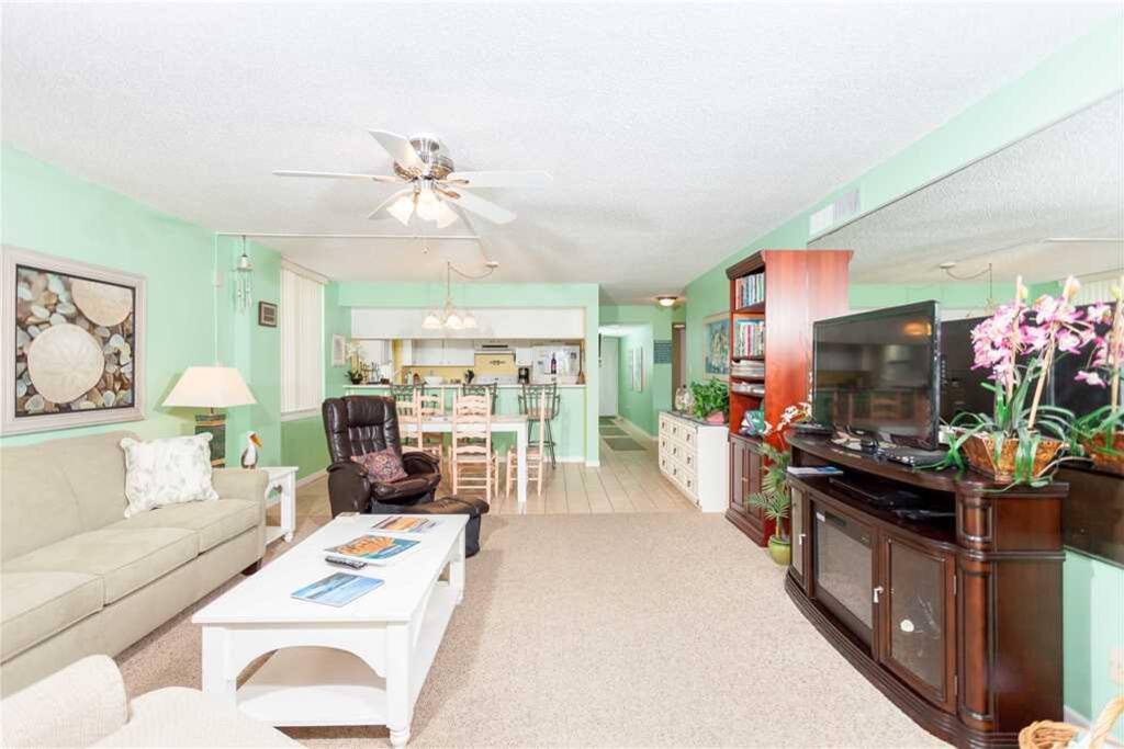 Charm and comfort are the keys at Sand Dollar 1108 - Soothing pastels, comfy furniture, a couch long enough to nap on, ocean view