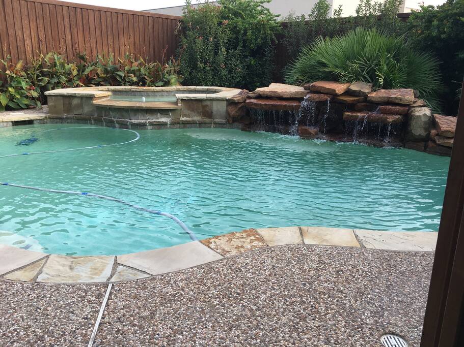 Pool/spa with waterfall