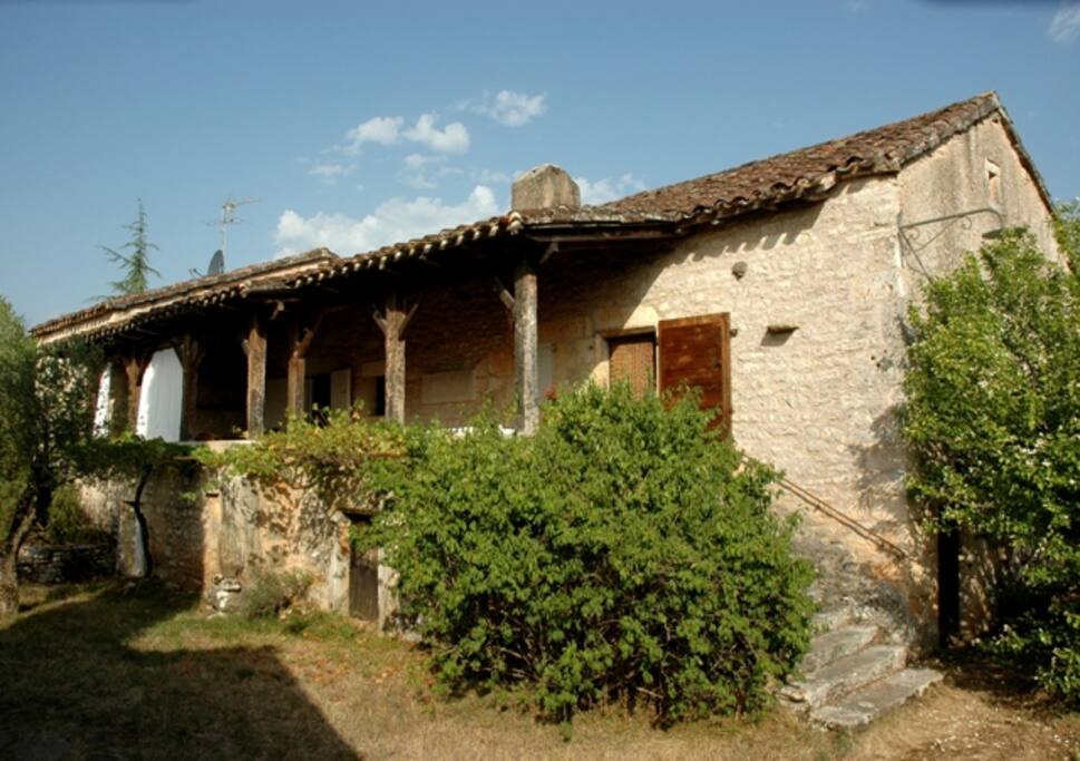 La maison et sa terrasse couverte