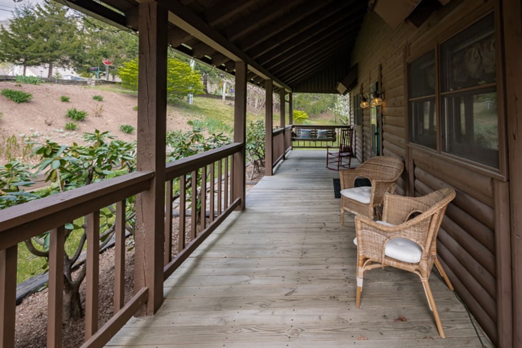 Great Front Porch with porch swing and rocking chairs to enjoy your morning coffee!