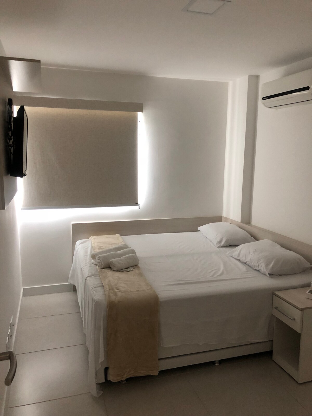 Sala social con camas individuales unidas, que se convierte en una cama matrimonial 