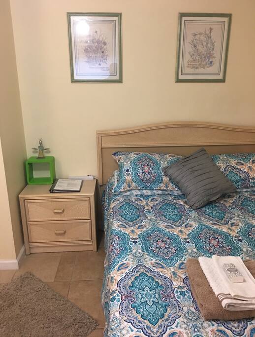 Handy bedside table with guest manual