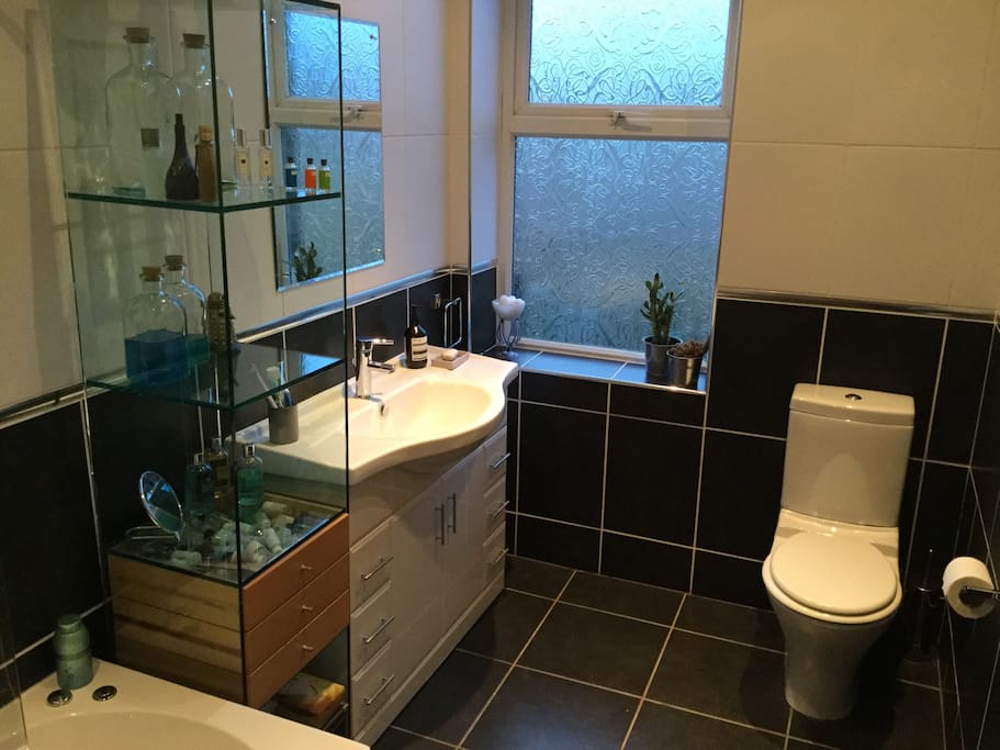 Modern and well equipped bathroom next to bedroom, almost exclusively for guest use