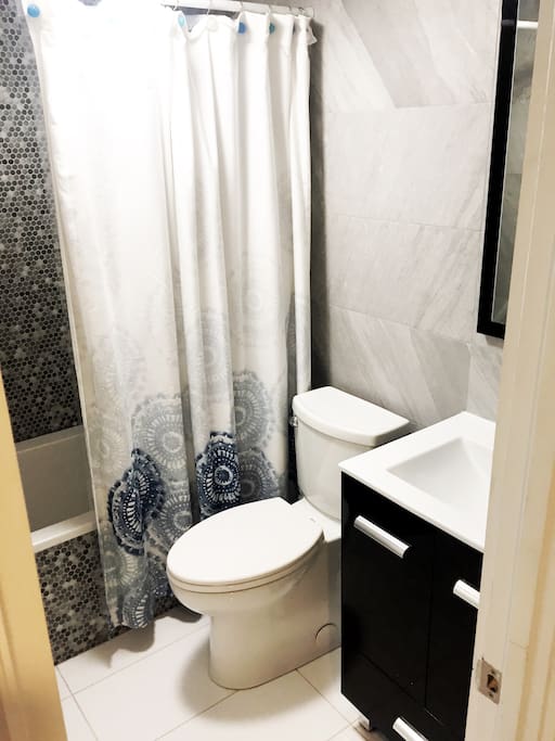 Private bathroom with full shower over tub in each bedroom.