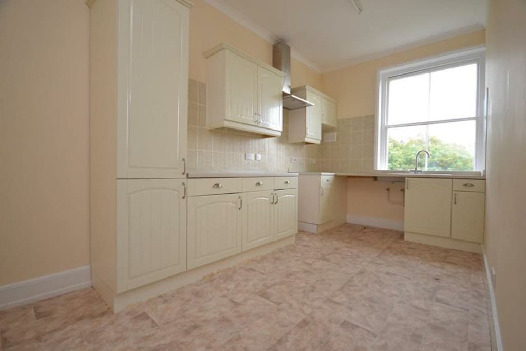 Large Kitchen with table and chairs